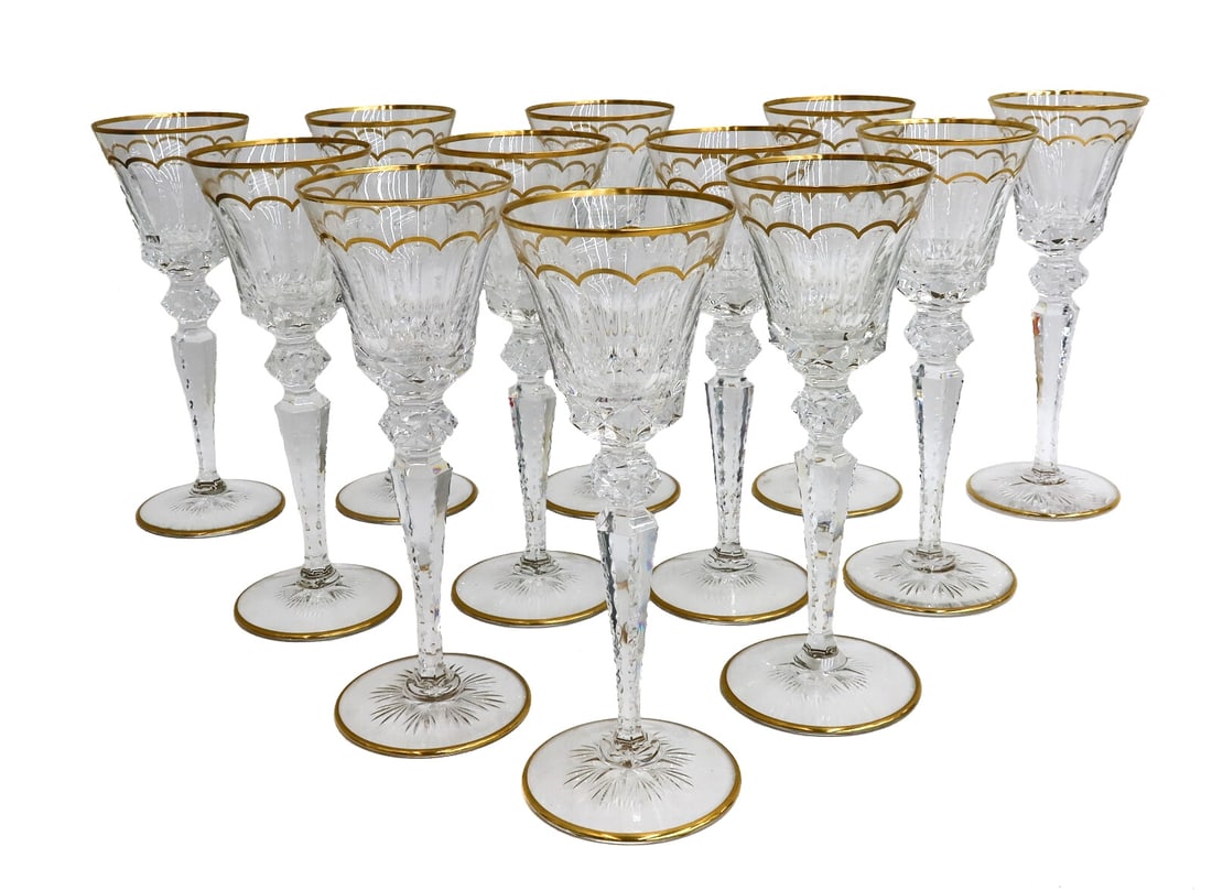 12 Saint St. Louis France Continental Wine Glass Goblets in Excellence Gold Trim: 12 Saint St. Louis France continental wine glass goblets in Excellence Gold Trim. Cut panel and cut foot with gold trim to rim and base. Acid etched Saint Louis mark to undersides of each. Weight: App