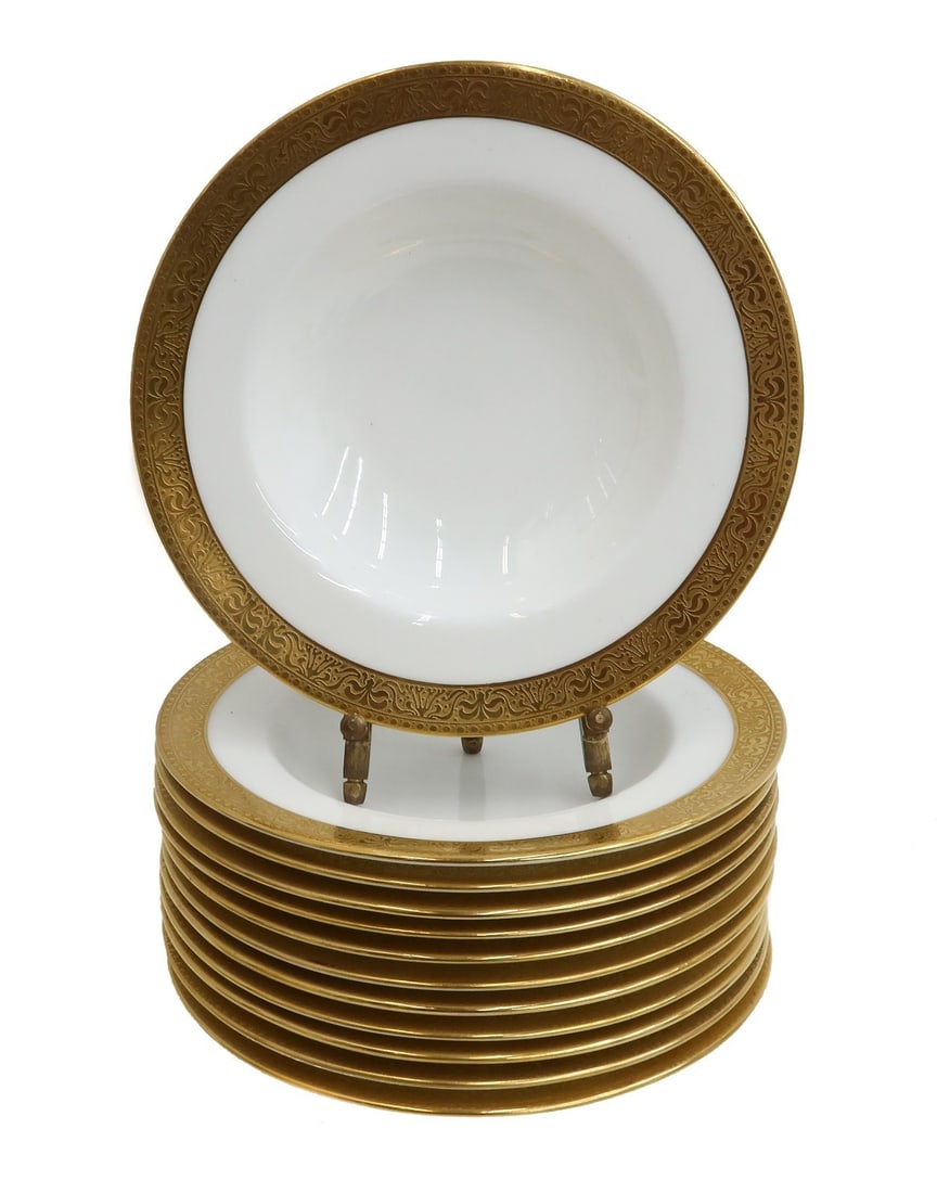 12 Lenox for Tiffany & Co Porcelain Gilt Rimmed Berry or Dessert Bowls c1920: 12 Lenox for Tiffany & Co porcelain and gilt rimmed berry or dessert bowls, circa 1920. Gilt ribbons and scrolls to rim. Weight: Approx. 6 lbs Measurements: Approx.6.36 inches diameter x 1 inches tall