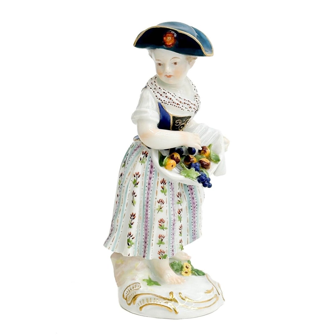 Meissen Germany Miniature Porcelain Figurine Gardener Child Girl w Fruits #72: Meissen Germany Hand Painted Miniature Porcelain Figurine Gardener Child #72. Depicts a gilt holding fruits in her apron. Underside with Meissen crossed swords mark, incised 72, impressed 48. Weight: 