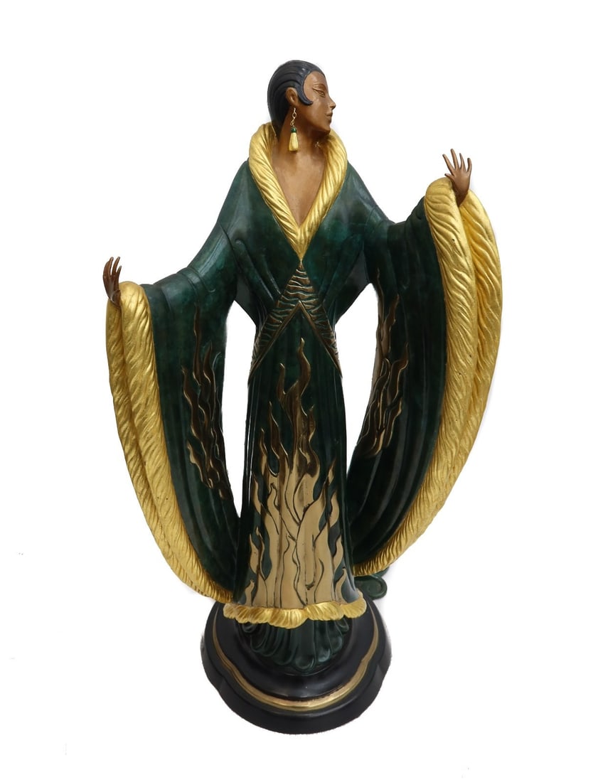 Erte Romain De Tirtoff Bronze Sculpture Femme de Luxe Ltd Ed 500 Signed: Erté (Romain De Tirtoff) (Russian/French 1892-1990) Painated and Gilt Bronze Sculpture, Femme de Luxe. Depicts a woman dressed in a long green fur coat with gilt flame decorations. Signed Erte to edg