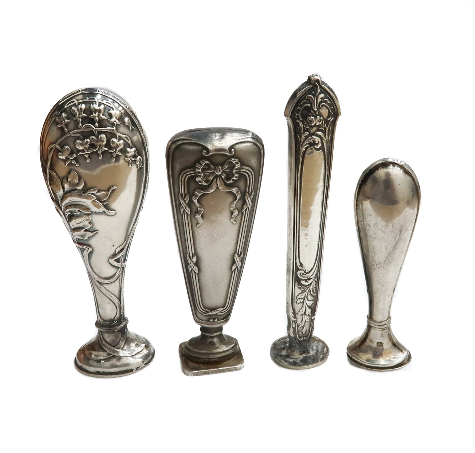 4 Silver Wax Seals: 4 Silver Wax Seals. Etched Art Nouveau leavves and ribbons throughout. Silver hallmarks to edge 19th / 20th century. Weight Approx., 1.6 ozt Measures Approx., Tallest: 3 inches / Shortest: 2.25 inches