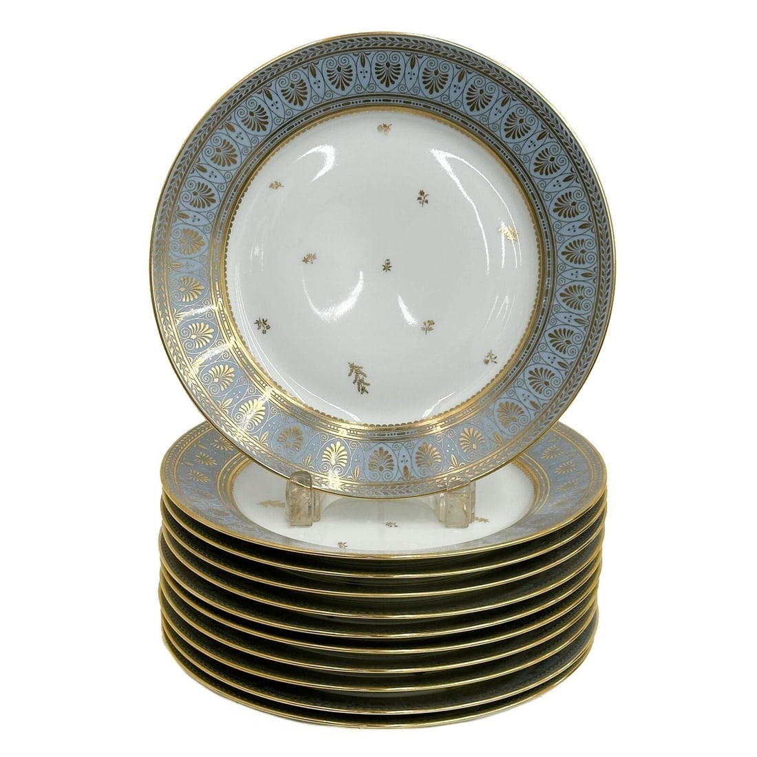 11 Manufacture de Sevres Porcelain Blue Agate Dinner Plates 1998: 11 Manufacture de Sevres Porcelain Blue Agate Dinner Plates. A blue ground to the edge, gilt palmettes and floral accents. Underside marked Manufacture Nationale Dore a Sevres BF, various incised mark