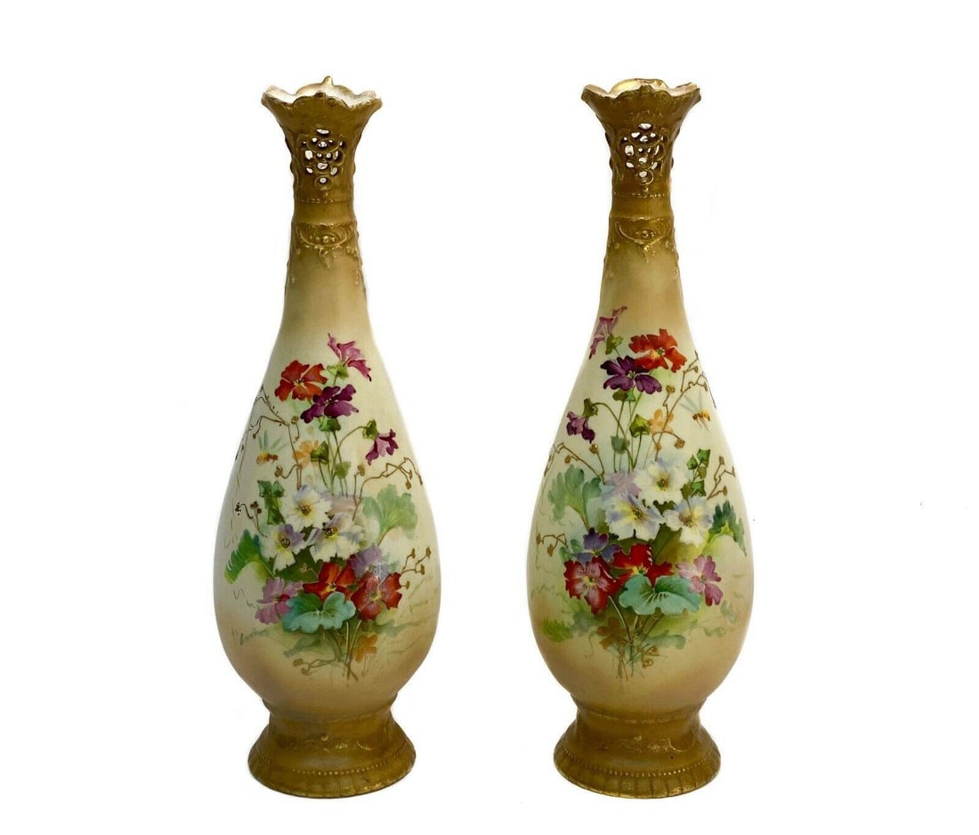 Pair Amphora Ernst Wahliss Austrian Porcelain Vases: Pair Amphora Ernst Wahliss Austrian Turn Wien Vienna hand painted porcelain vases, circa 1910. Hand painted colorful florals to center with gilt accents. Raised decoration to stem, reticulated design