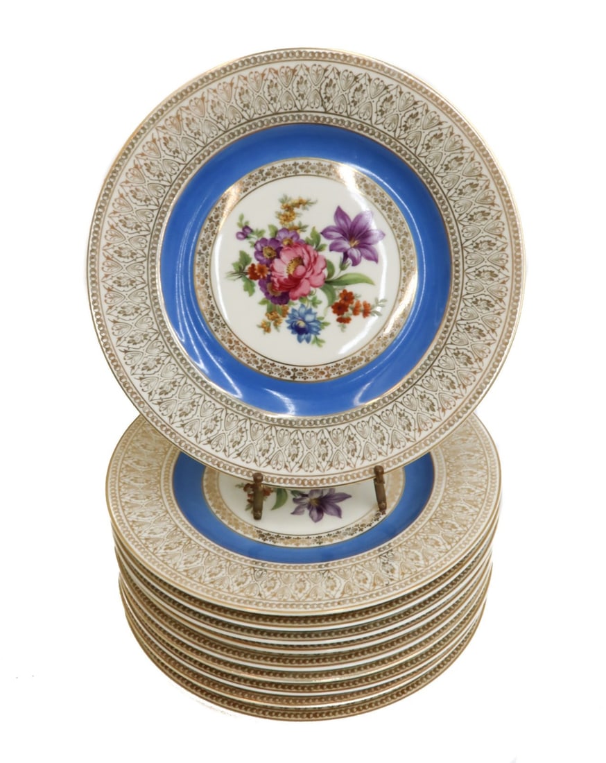 10 Pirkenhammer Czechoslovakia Porcelain Blue Gilt Floral Dinner Plates c1930: 10 Pirkenhammer Czechoslovakia Porcelain Blue Gilt Floral Dinner Plates circa 1930. Light blue ground with multi color flowers to center. Gilt leaf pattern to edge. Pirkenhammer mark to underside. Wei