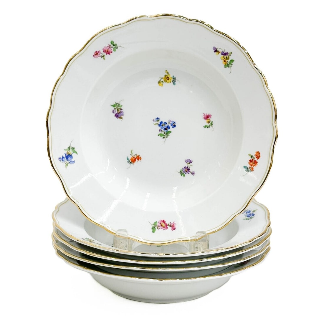 5 Meissen Germany Hand Painted Florals Porcelain Rimmed Soup Bowls 20th century: 5 Meissen Germany Hand Painted Porcelain Rimmed Soup Bowls, 20th century. A white ground decorated with colorful florals, gilt to the scalloped rim. Underside with crossed swords marks Weight: Approx.