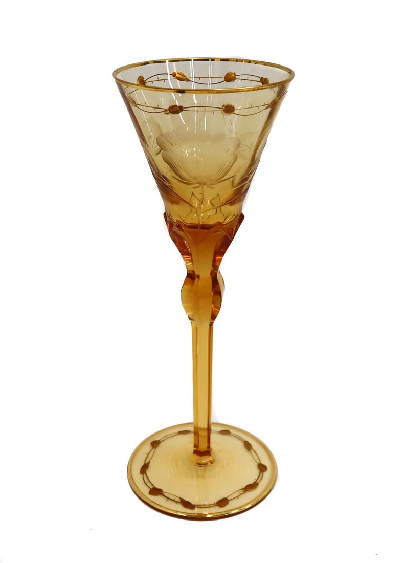 Moser Czech Cut Crystal Glass Claret Wine Goblet in Paula Amber Orange and Gilt: Moser Czech cut crystal glass claret wine goblet in Paula Amber Orange and Gilt. Gilt intaglio engraved floral decoration to rim and foot. Multi-sided knobbed stem. Acid etched "Moser" to base. Weight