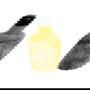 Chinese Carved Translucent Jade Agate Stone Snuff Bottle Mi Lo Fu Buddha c1820: Chinese Carved Translucent Jade and Agate Stone Snuff Bottle, circa 1820. Carved high relief image depicting Mi Lo Fu Buddha in colorless jade transitioning to agate. Dark green glass stopper, stopper