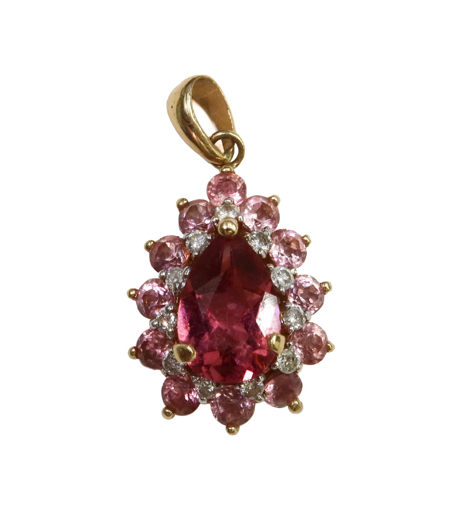 14k Yellow Gold Pink Tourmaline and Diamond Halo Pear Drop Pendant.: 14k Yellow Gold Pink Tourmaline and Diamond Halo Pear Drop Pendant. Dark pink pear shaped pink tourmaline to center surrounded by 11 round cut diamonds weighing approximately 0.22 carats and 12 lighte
