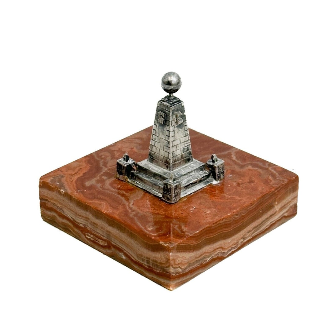 South American Silver & Marble Monument to the Equator Ornament Paperweight: South American Silver Monument to the Equator Silver Ornament Paperweight on Red Siena Marble Base, circa 1940. Weight: Approx. 1 lb Measurements: Approx. Total: 3.25 inches x 3.25 inches x 2.75 inche