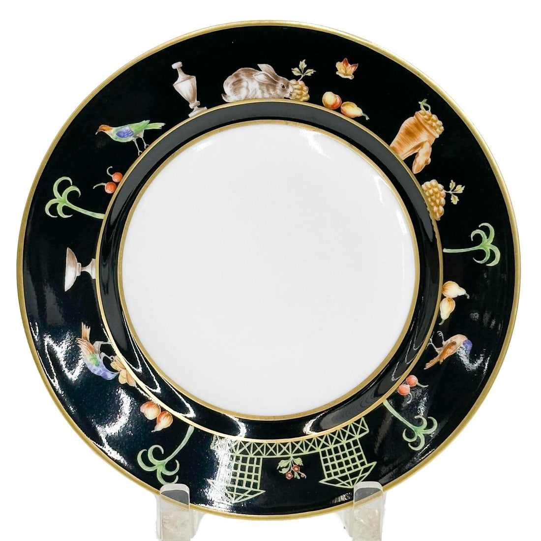 Tiffany Le Tallec Private Stock Cabinet Dessert Plate in Black Shoulder: Tiffany Le Tallec Private Stock Dessert Plate in Black Shoulder. A black ground decorated with rabbits, birds, and fruits around the rim. Underside with Tiffany Private Stock marks. Weight: Approx. 1