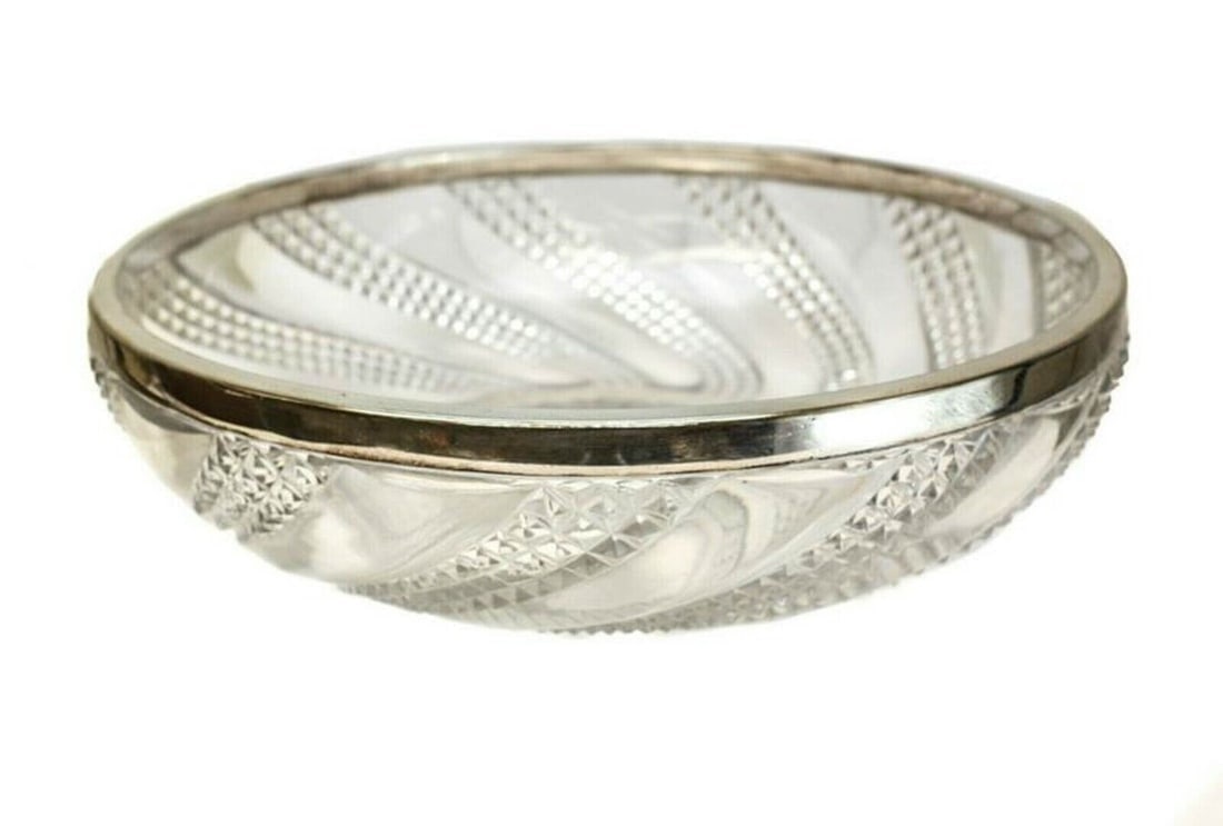 Baccarat Depose Glass & Silverplate Centerpiece Bowl: Baccarat Depose Glass & Silverplate Centerpiece Bowl. A large Baccarat Depose cut glass and silverplate centerpiece bowl. Cut glass diamond swirls throughout the body with a silverplate rim. Embossed