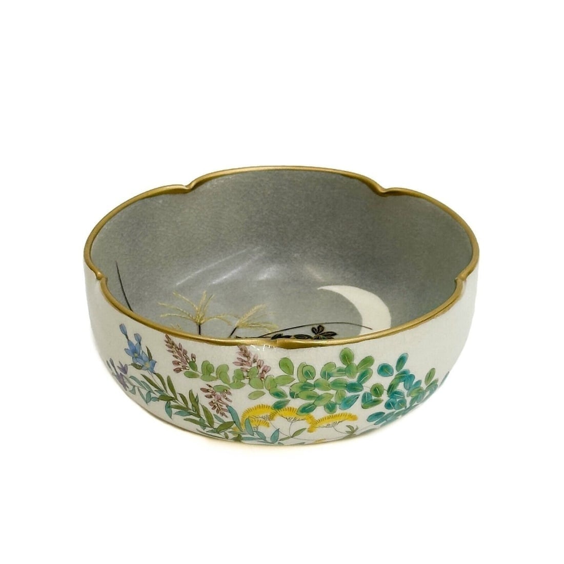 Koshida Japanese Satsuma Hand Painted Porcelain Bowl: Koshida Japanese Satsuma Hand Painted Porcelain Bowl. Hand painted florals, moon background to interior. Underside marked Koshida ?? Weight: Approx. .5 lb Measurements: Approx. 4.825 inches diameter x