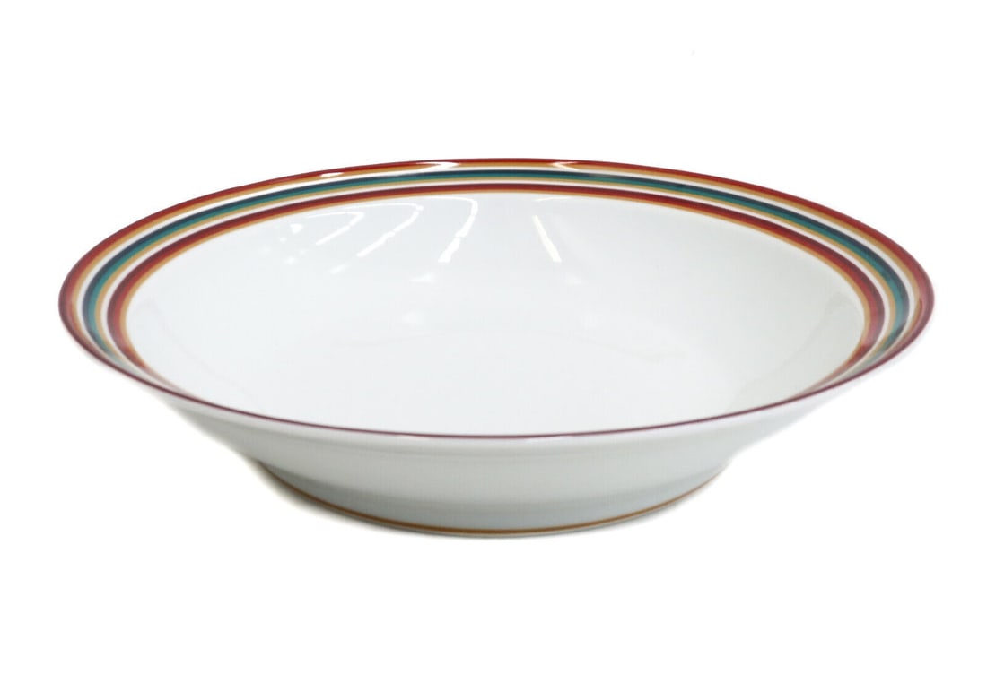 Hermes Paris Porcelain Round Serving Bowl in Attelage, Red and Green Stripes: Hermes Paris porcelain round serving bowl in Attelage. Green and red stripes to rim. Hermes mark to underside. Weight Approx., 3 lbs Measures Approx., 11.5 inches diameter x 2.5 inches tall Domestic S