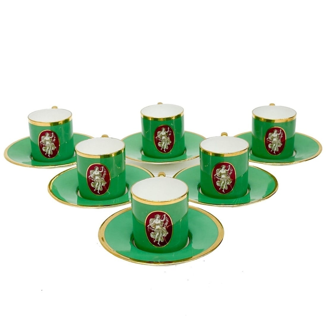 6 Minton England Porcelain Demitasse Cup & Saucers Green circa 1930: 6 Minton England Porcelain Demitasse Cup & Saucers. A green ground, hand painted medallion to the edge with a classical figure of a woman. Underside with Minton marks, retail marks for Tatman. Weight: