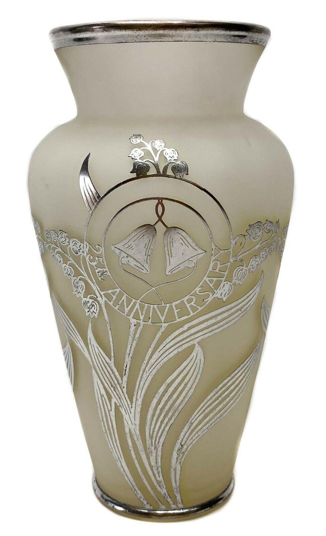 American Sterling Silver Overlay 25th Anniversary Midcentury Vase: Large midcentury, frosty white glass vase with sterling silver overlay and inscription reading "25th Anniversary". Weight Approx., 2 lbs Measures Approx., 5.6 in. diameter x 10.1 in. tall 