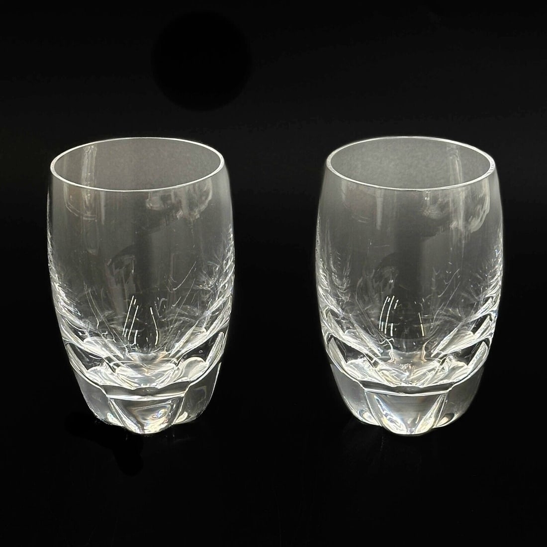 Pair Lalique France Crystal Glass Flat Wine Tumblers in Highlands Signed: Pair Lalique France Crystal Glass Flat Wine Tumblers in Highlands. Signed Lalique France Weight Approx., 1 lb Measures Approx., 2.5 inches diameter x 3.75 inches Domestic Shipping:$30