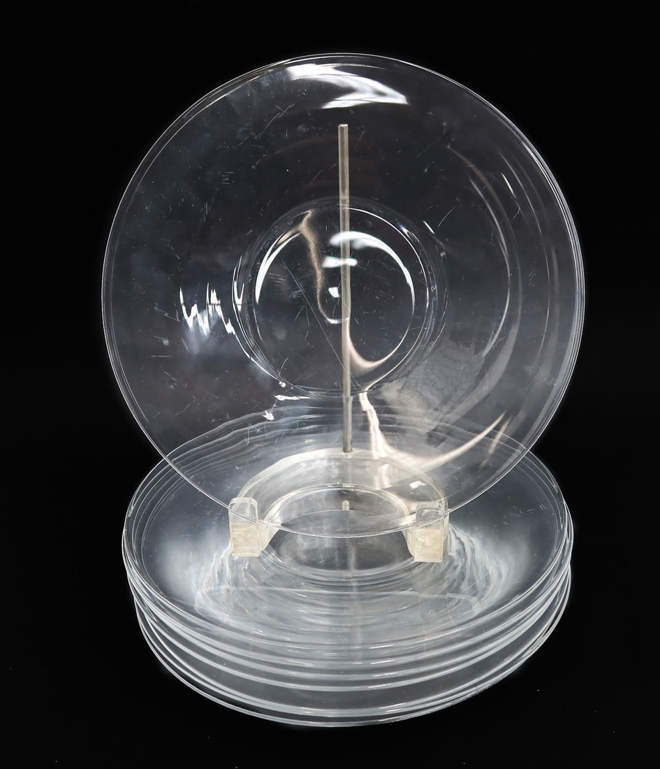 8 Steuben Colorless Crystal Glass 8.625 inch Plates Signed: 8 Steuben colorless crystal glass 8.625 inch plates, signed. Marked "S" to underside edge. Weight: Approx. 12 lbs Measurements: Approx. 8.625 inches diameter Condition: Good condition. Moderate surfac