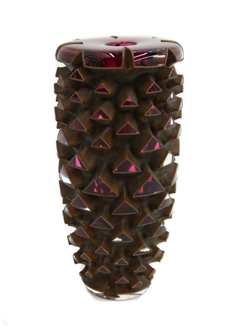 Michael M. Glancy (American 20th C) Ruby Triskelion in Bean's Scale Sculpture: Michael M. Glancy (American 20th C) Ruby Triskelion in Bean's Scale sculpture, 1985. Copper with blown ruby glass triangles throughout. Artist initial to underside and etched Title and date to edge. W