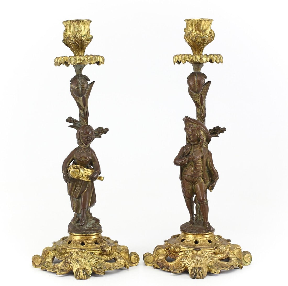 Pair of French Gilt Bronze Candlesticks, 19th Century Male & Female Musicians: Pair of French Gilt Bronze & Candlesticks, 19th Century. Charming Male & Female Musician Figures w/ Flute & Mandolin Respectively attired in Colonial style Dress. Foliate scrolls compasses the base of