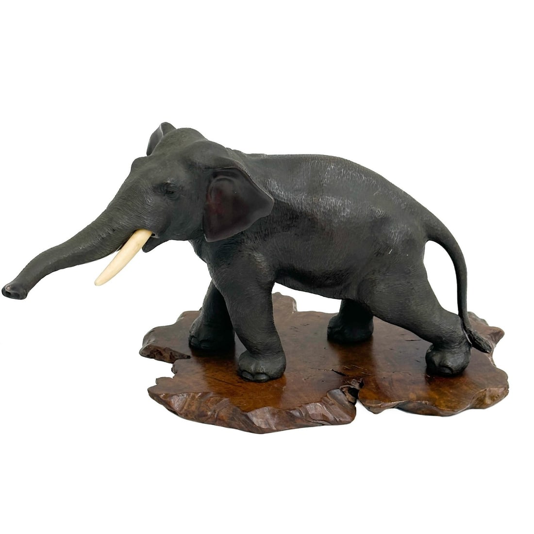 Genryusai Seiya Japanese Bronze Okimono Sculpture Elephant with Wood Base: Genryusai Seiya Japanese Bronze Okimono Sculpture Elephant. With carved natural tusks. Underside signed for Genryusai Seiya. On a removable wood base. Weight: Approx. 5 lbsMeasurements: Approx. Elepha