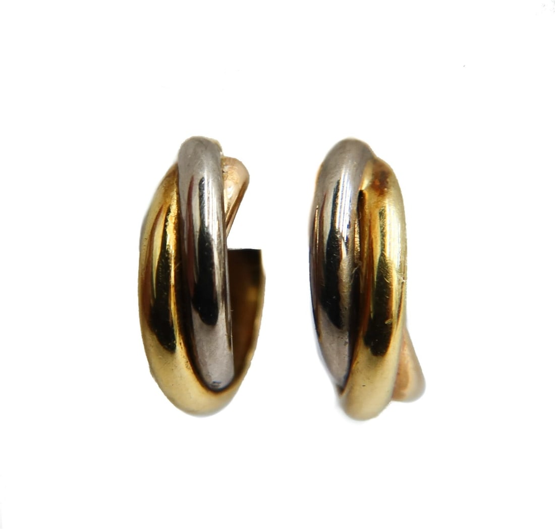 Cartier 18k Yellow White and Rose Gold Trinity Hoop Earrings: Cartier 18k Yellow, White, and Rose Gold Trinity Hoop Earrings. Intertwined yellow, white, and rose gold hoops to each earring. Marked "Cartier 750" with original Cartier box and certificate. Weight A