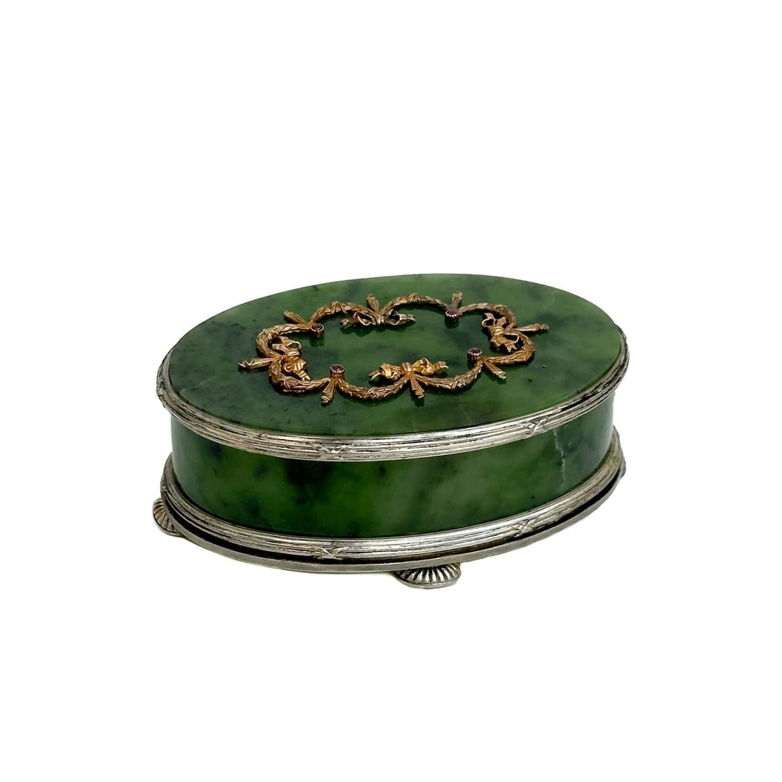 Silver and 14k Gold Ruby Mounted Carved Nephrite Jade Box with Russian Hallmarks: Silver and Gold Mounted Carved Nephrite Jade Box with Russian Hallmarks. Top accent decoration tested for 14k gold, mounted rubies. With hallmarks purportedly for Faberge and work master for HW purpor