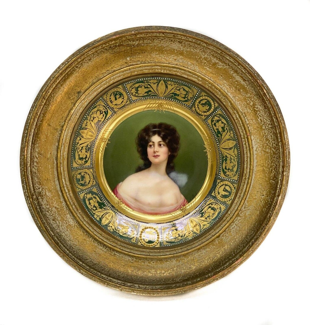 Royal Vienna Austria Hand Painted Porcelain Plate: Royal Vienna Austria hand painted porcelain plate in period frame, artist signed, circa 1910. Plate with a green ground with raised gilt floral design with images of scenery and birds to edge and whit