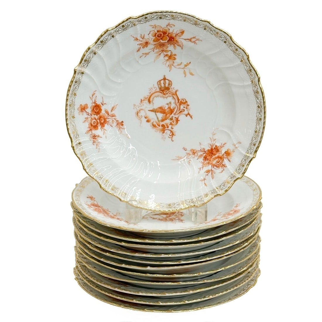 12 Berlin KPM Neuosier Royal Dinner Plates Emperor Kaiser Wilhelm II circa 1900: 12 Berlin KPM Neuosier Royal Dinner Plates, circa 1900. A white ground with a textured basketweave finish to the edge, hand painted red and gilt eagle and florals to the center. Gilt to the scalloped
