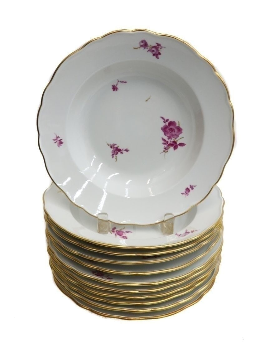 11 Meissen Germany Hand Painted Porcelain Rimmed Soup Bowls: 11 Meissen Germany Hand Painted Porcelain Rimmed Soup Bowls. Hand painted purple flowers with gilt accents. Scalloped rim. Meissen mark to underside. Weight Approx., 10 lbs Domestic Shipping: $60