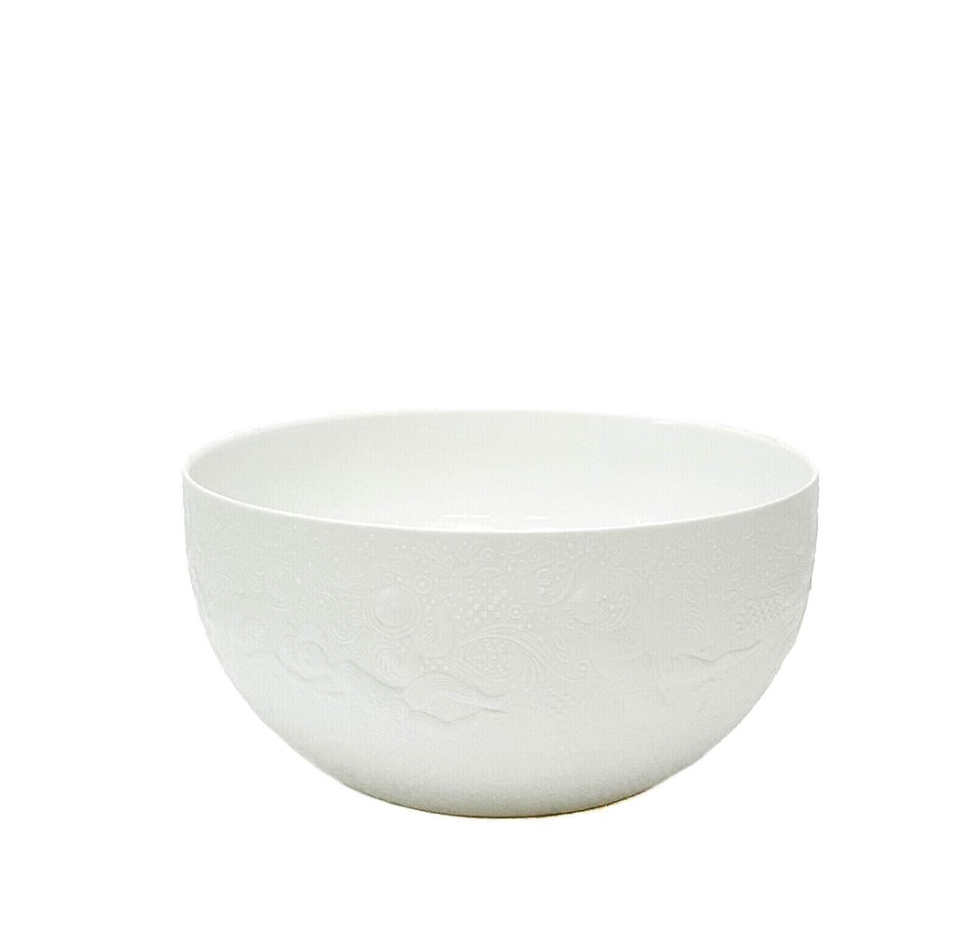 Rosenthal German Porcelain 8 Inch Diameter Vegetable Bowl in Magic Flute White: Rosenthal German porcelain vegetable bowl in Magic Flute White. White porcelain with embossed figures around the exterior with a matte finish. Underside marked Rosenthal Germany, Bijorn Wiinblad. Weig