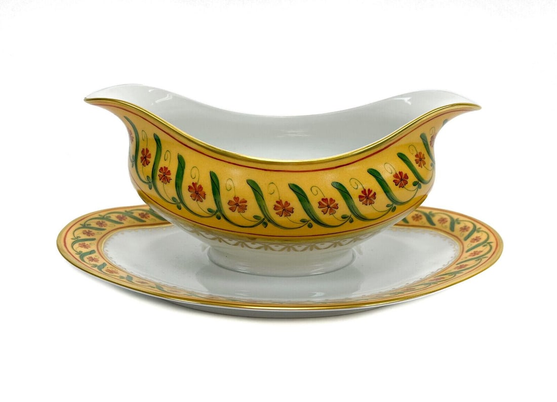 Tiffany Le Tallec Private Stock Porcelain Gravy Boat in Directoir: Tiffany Le Tallec Private Stock porcelain gravy boat plates in Directoir. A yellow ground with hand painted flowers and leaves throughout. Gilt florals to the center. Tiffany & Co. Private stock marks