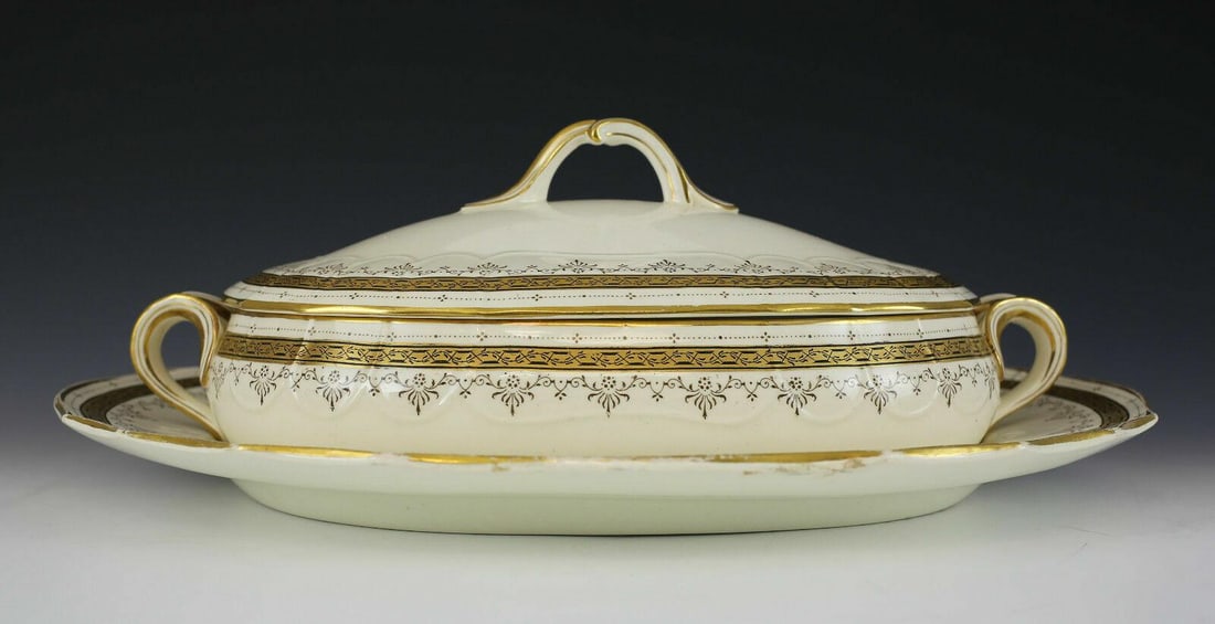 Cauldon Porcelain Covered Vegetables Bowl & Saucer: Brown Westhead Moore and Co. Cauldon Porcelain Covered Vegetable Bowl & Under Plate, Hand Painted Gilt & Black Foliate Design on Cream. Marked Brown Westhead Moore & Co. Weight 6 lbs Approximately tal