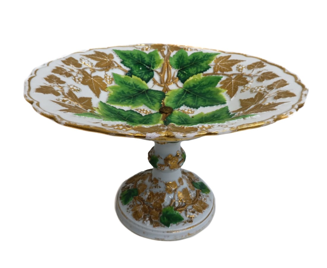 Meissen Porcelain Hand Painted and Gilt Leaf and Grapevine Footed Compote 19th C: Meissen Germany porcelain footed compote, 19th Century. Hand painted leaves with gilt grapevines throughout. Meissen mark to underside. Weight: Approx. 6 lbs Measurements: Approx. 11 inches diameter x