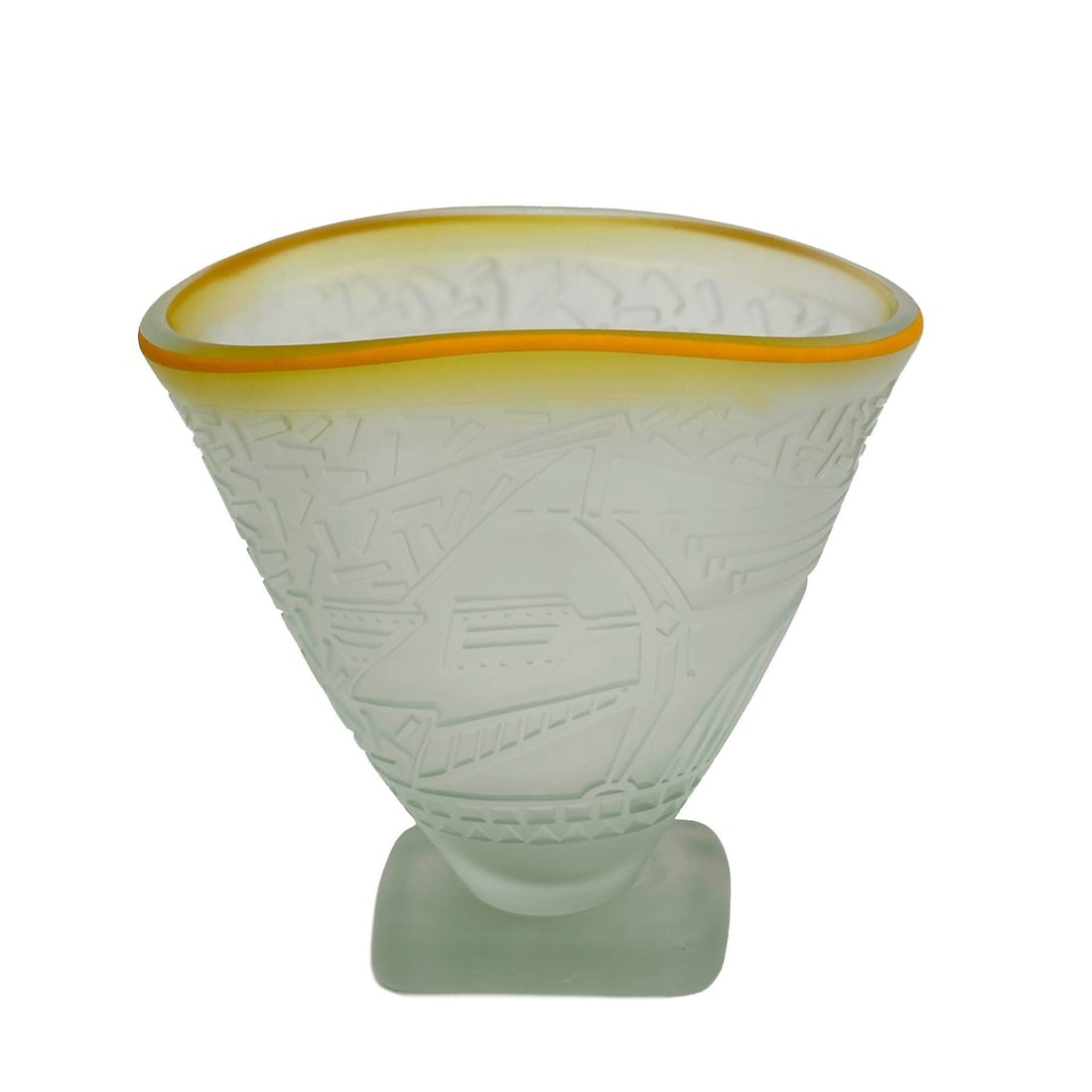 Dan Dailey (b 1947) Blown Sandblasted Art Glass Sculpture Vase Signed 1980: Dan Dailey (b 1947) Blown Sandblasted Art Glass Sculpture Vase. Light green vase with raised geometric decoration to the body, orange to the rim. Artist etched signature to the lower edge of the base,