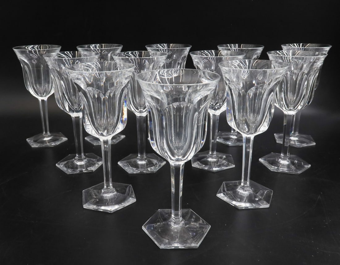12 Baccarat France Cut Glass Claret Wine Goblets in Malmaison Signed: 12 Baccarat France cut glass claret wine goblets in Malmaison. Cut glass thumbprints to exterior of bowl with hexagonal base. Acid etched Baccarat mark to underside. Weight: Approx. 5 lbs Measurements