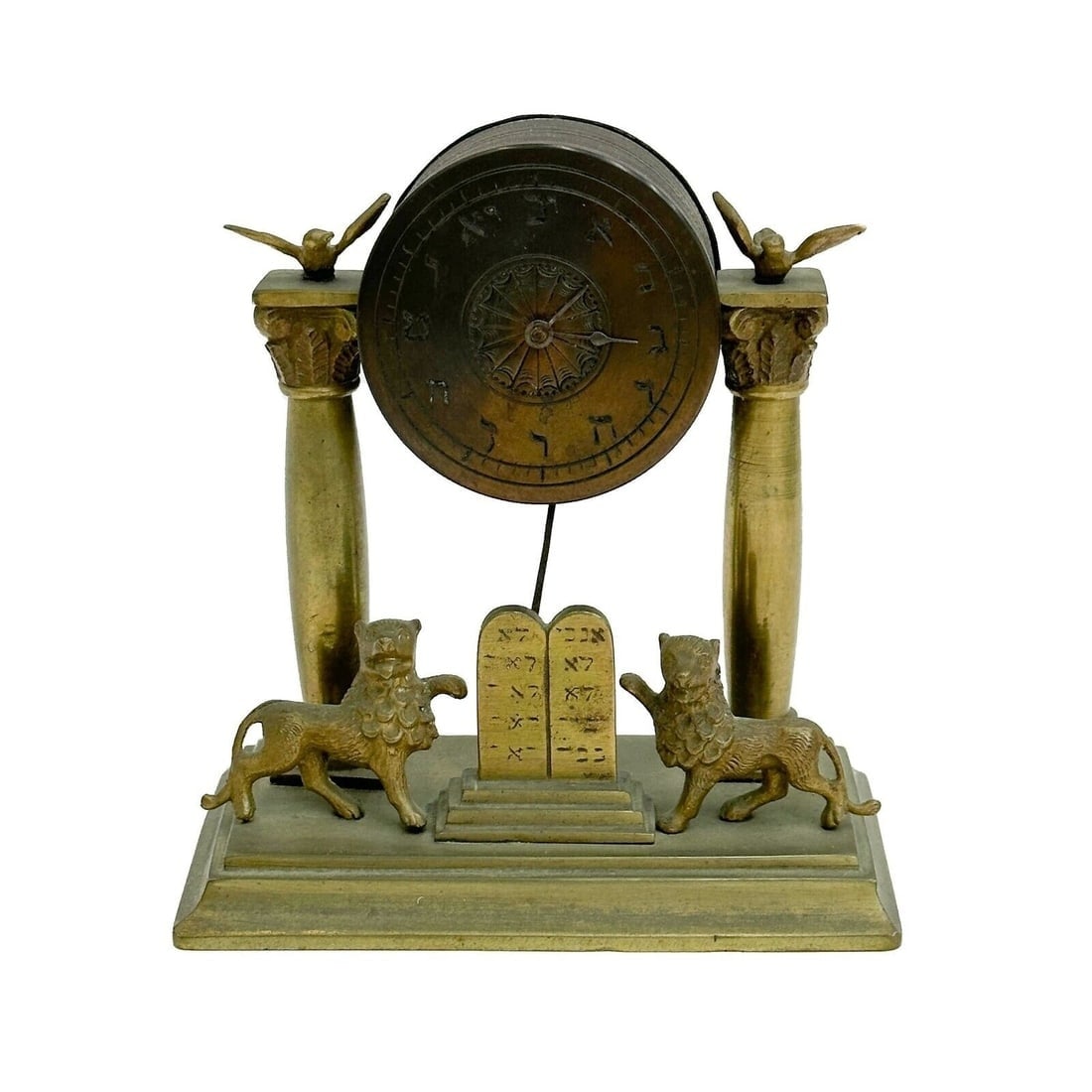 Austrian Judaica Gilt Bronze Table Clock Lions 10 Commandments c 1880: Austrian Judaica Gilt Bronze Table Clock, circa 1880. Depicts two lions to the base with the Ten Commandments. Weight: Approx. 1.5 lbs Measurements: Approx. 4.625 inches x 2.625 inches x 4.825 inches