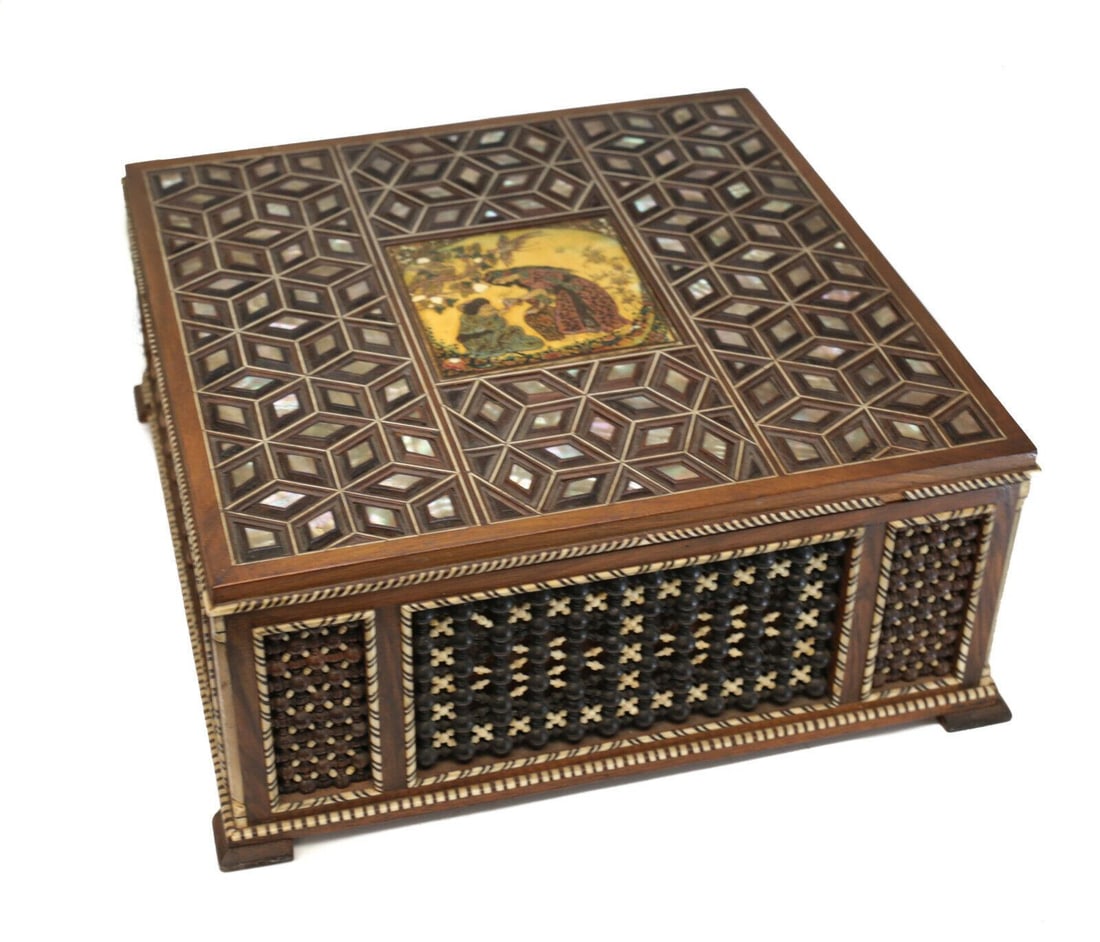 Antique Middle Eastern Hand Painted Tile Mother of Pearl Inlaid Bead Paneled Box: Antique Middle Eastern hand painted tile Mother of Pearl inlaid bead paneled box, circa 1910. A Middle eastern figural scene to the center of the lid. Blue satin interior, and the interior box can be