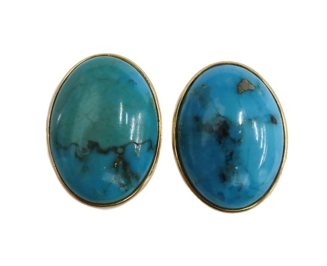 14k Yellow Gold and Cabochon Blue Hardstone or Synthetic Twist Back Earrings: 14k Yellow Gold and Cabochon Blue Hardstone or Synthetic Twist Back Earrings. Oval blue cabochon hardstones measuring approximately 18mm x 13mm x 4.7mm. Marked 585 Weight Approx., 5.14 grams Measures