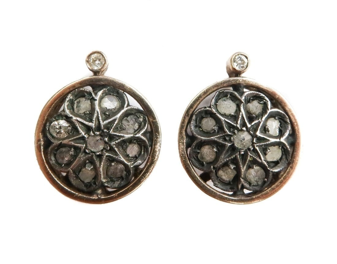 14k Yellow Gold and Silver Old Mine Cut Earrings: 14k Yellow Gold and Silver Old Mine Cut Earrings. 20 round cut old mine diamonds weighing approximately 0.5 carats. Tests for 14k gold to the frame and silver to the face. Weight Approx., 6.34 grams M