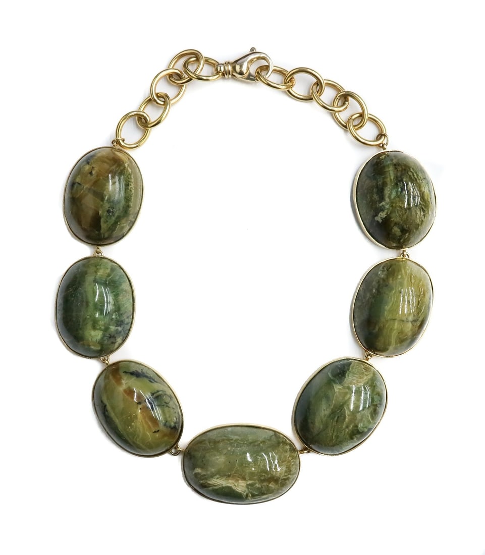 Faraone Mennella 14k Yellow Gold and Chatoyant Green Opal Necklace: Faraone Mennella 14k Yellow Gold and Chatoyant Green Opal Necklace. 7 cabochon cut chatoyant green opals measuring approximately 1.625inches x 1.25 inches x 0.5 inches each. Marked "585" with maker ma