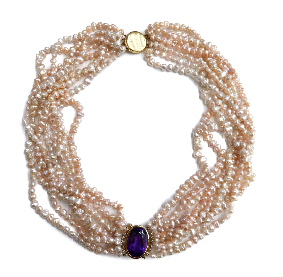 Tiffany & Co. 18k Yellow Gold Amethyst and Cultured Freshwater Pearl Necklace: Tiffany & Co. 18k yellow gold amethyst and cultured freshwater pearl necklace. 8 strand pink freshwater cultured pearls measuring approximately 3.7mm. Oval amethyst to clasp measuring approximately 17