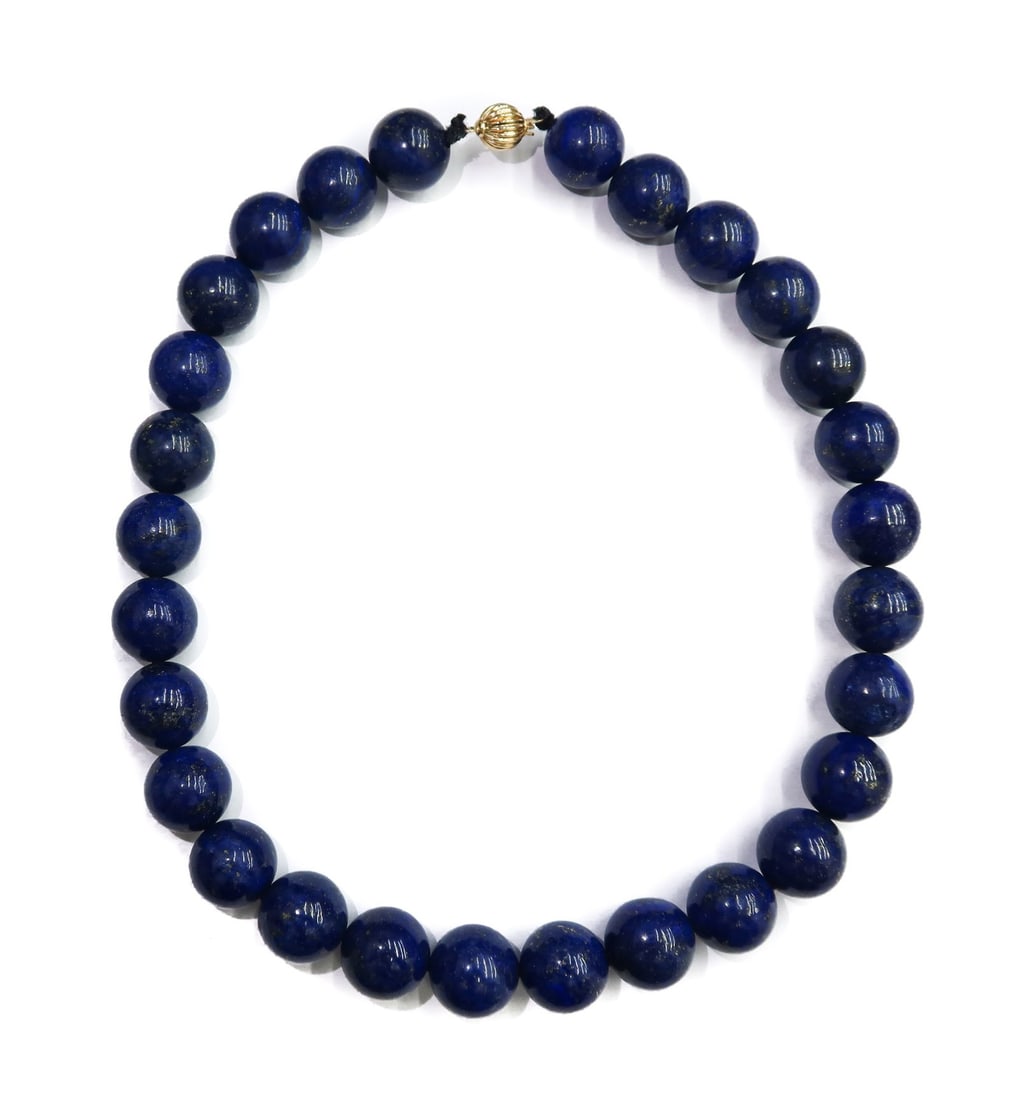14k Yellow Gold and Lapis Lazuli Necklace: 14k Yellow Gold and Lapis Lazuli Necklace. Lapis Lazuli beads measuring approximately 14.2mm. Marked "14k" to ball clasp. Weight Approx., 127.43 grams Measures Approx., 16 inches length Domestic Shipp