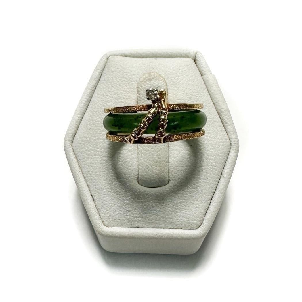 14k Yellow Gold Nephrite Jade and Diamond Ring. Size 4.5: 14k Yellow Gold Nephrite Jade and Diamond Ring. Gold frame with a Nephrite Jade Center. Applied diamond to edge. Unmarked, but tests for 14k Gold. Weight Approx., 4.22 grams Size 4.5 Domestic Shipping
