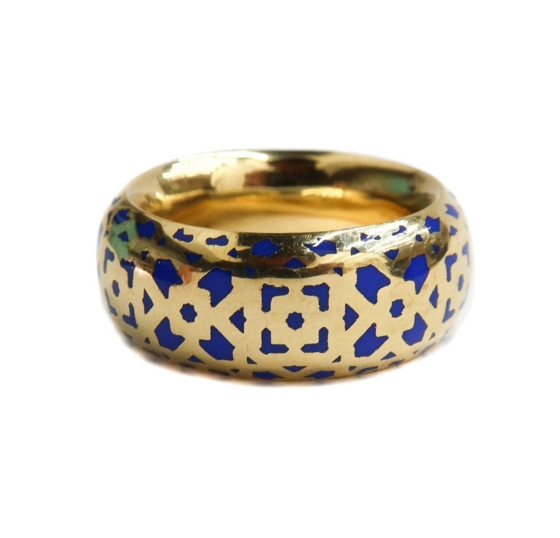 Tiffany & Co 18k Yellow Gold Blue Enamel Marrakesh Ring by Paloma Picasso Size 8: Tiffany & Co 750 18k yellow gold and blue enamel Marrakesh band ring by Paloma Picasso. Intricately cut band inspired by the Moroccan architecture with blue enamel inlay. Signed Paloma Picasso Tiffany