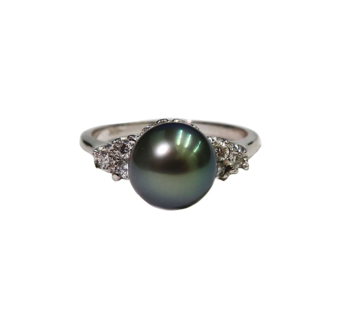 18k White Gold Black Pearl and Diamond Ring Size 6.75: 18k White Gold Black Pearl and Diamond Ring. 8.4mm. 6 round cut diamonds to band measures approximately 0.15 carats. Marked 18k to band Weight Approx., 4.09 grams Measures Approx., Suze 6.75 Domestic