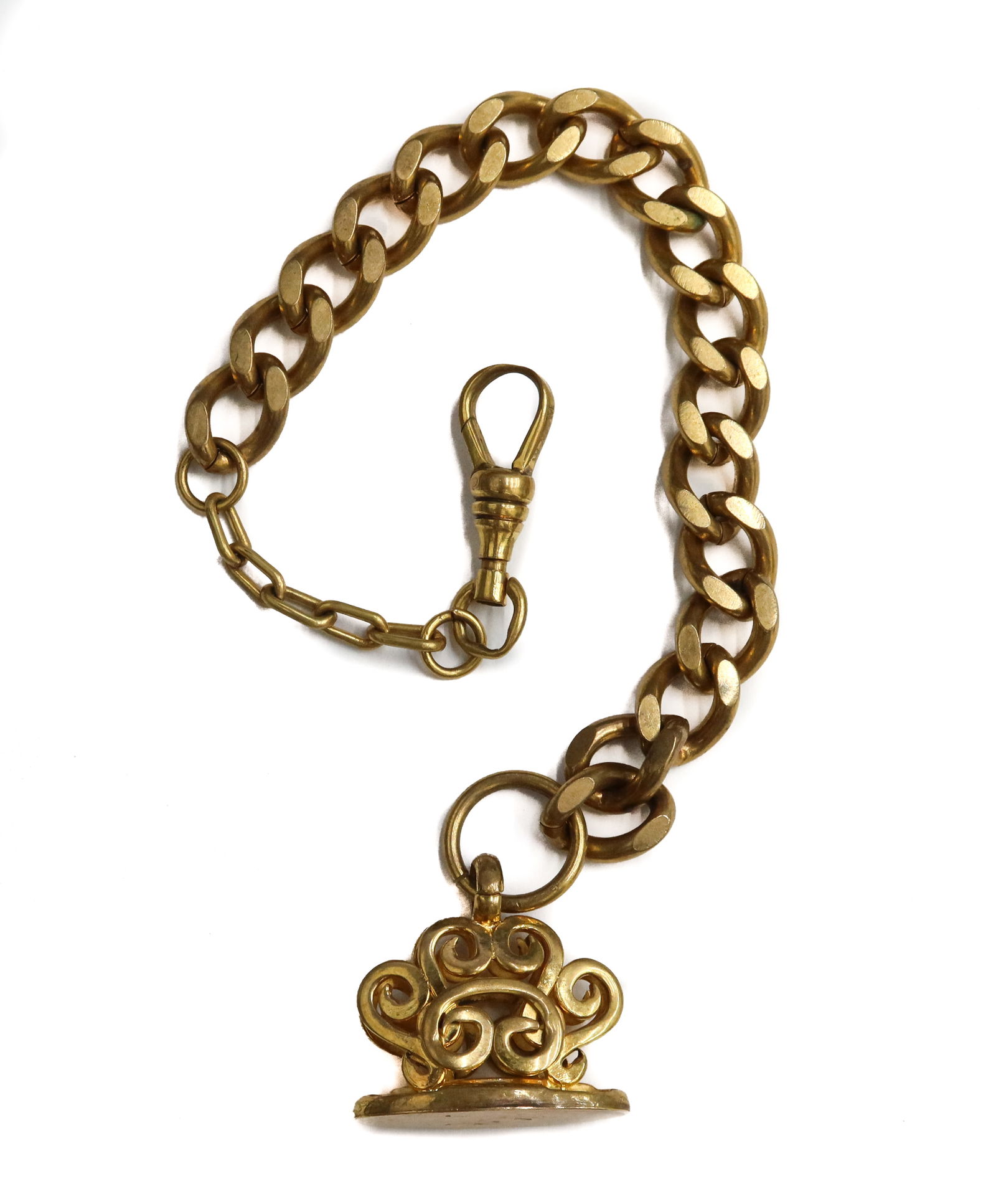 Gold Filled Curb Chain Watch Fob with Seal: Gold filled Curb Chain Watch Fob with Seal. Curved design to seal. Maker mark "WWM" to clasp. Weight Approx., 24 grams Measures Approx., 8.325 inches length Domestic Shipping:$25
