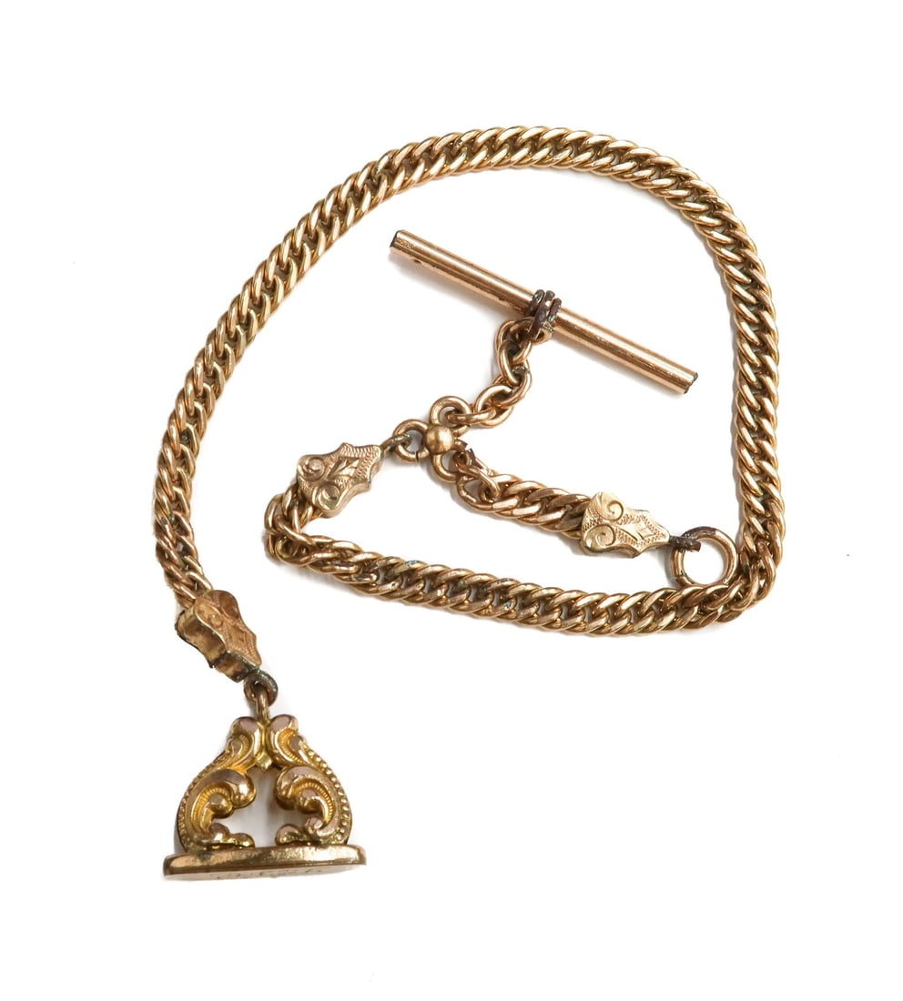 Gold Filled Albert T Chain Watch Fob with Seal: Gold filled Albert T Chain Watch Fob with Seal. Folaite scrolls to seal. Monogrammed "LH" to edge of seal. Weight Approx., 25.20 grams Measures Approx., 12 inches length Domestic Shippig:$25