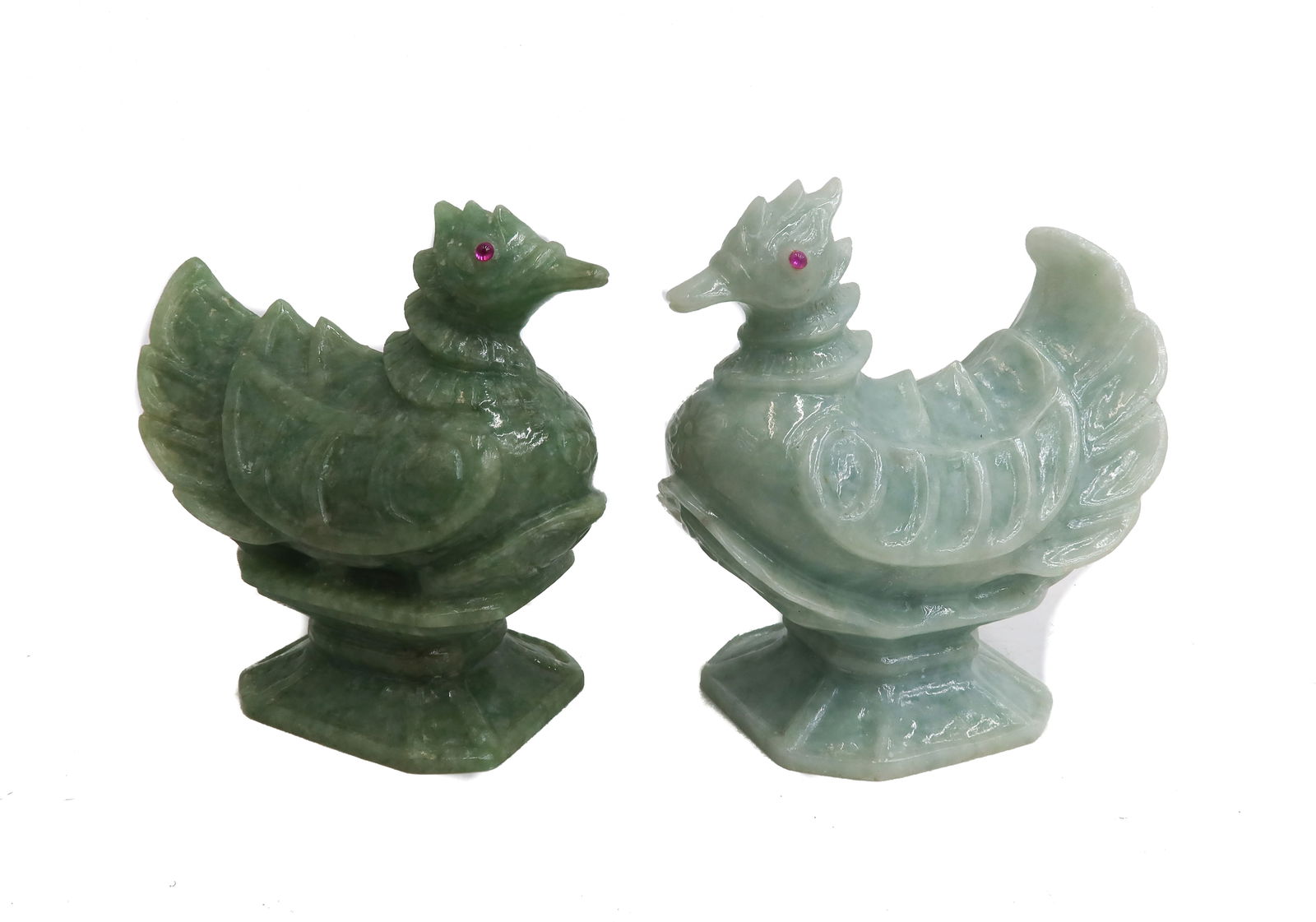 2 Jade or Jadeite and Ruby Eyed Mythical Bird Figures Mid 20th Century: 2 Jade or Jadeite and Ruby Eyed Mythical Bird Figures Mid 20th Century. Attractive and well carved heavy jade or jadeite mythical birds with cabochon ruby eyes. Possibly Chinese. Weight Approx., 1046