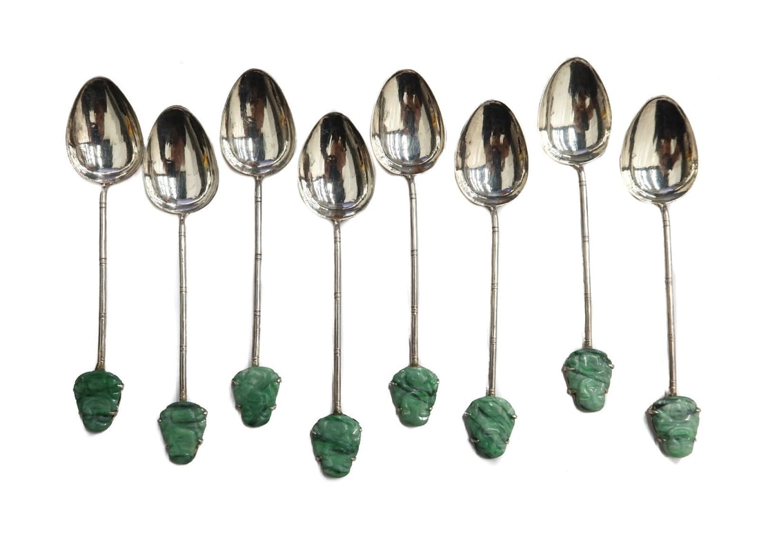 8 Chinese Silver Bamboo and Jade Buddha Teaspoons: 8 Chinese Silver Bamboo and Jade Buddha Teaspoons. Carved jade to the form of Buddha to finials. Etched handles to emulate bamboo sticks. Marked to verso and tests for silver. Weight: Approx. 1.9 ozt