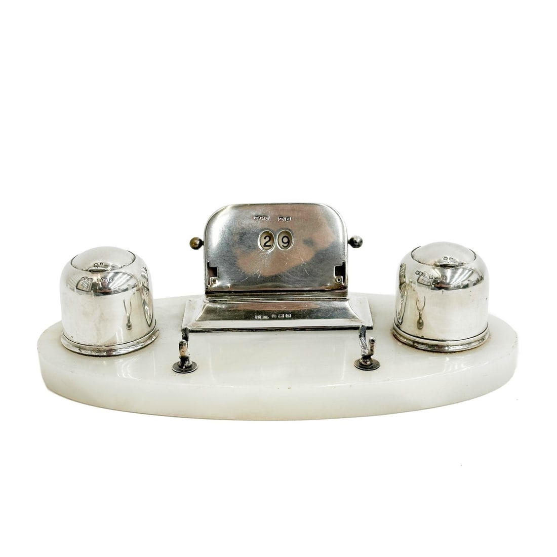 Wilmot Mfg Co Sterling Silver Marble Double Inkwell Calendar Stand 1925: Wilmot Manufacturing Co English Sterling Silver Mounted White Marble Double Inkwell Calendar Stand. Double inkwells with glass liners, inkwell covers slide back. Calendar to center with changeable dat